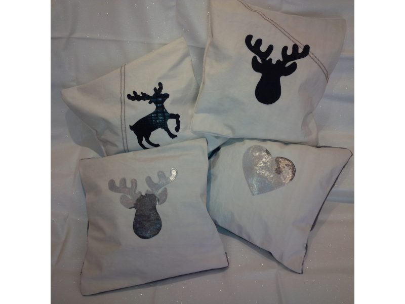 PETITS COUSSINS APPLIQUES EN CUIR PETITS COUSSINS APPLIQUES EN CUIR